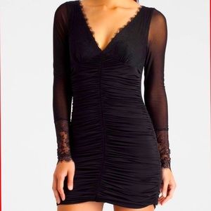 Guess by Marciano black lace cocktail dress with long sleeves, size small.